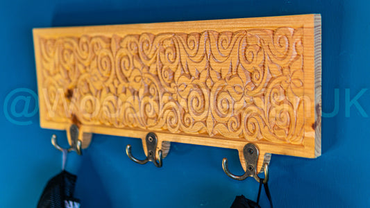 Blooming Beauty: Flower Carved Wooden Coat Hanger.